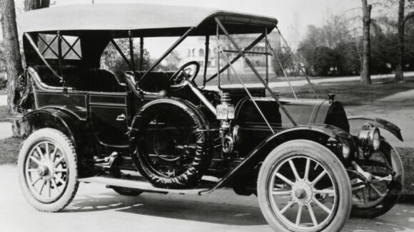 A black and white photo of a 1911 Carhartt car.